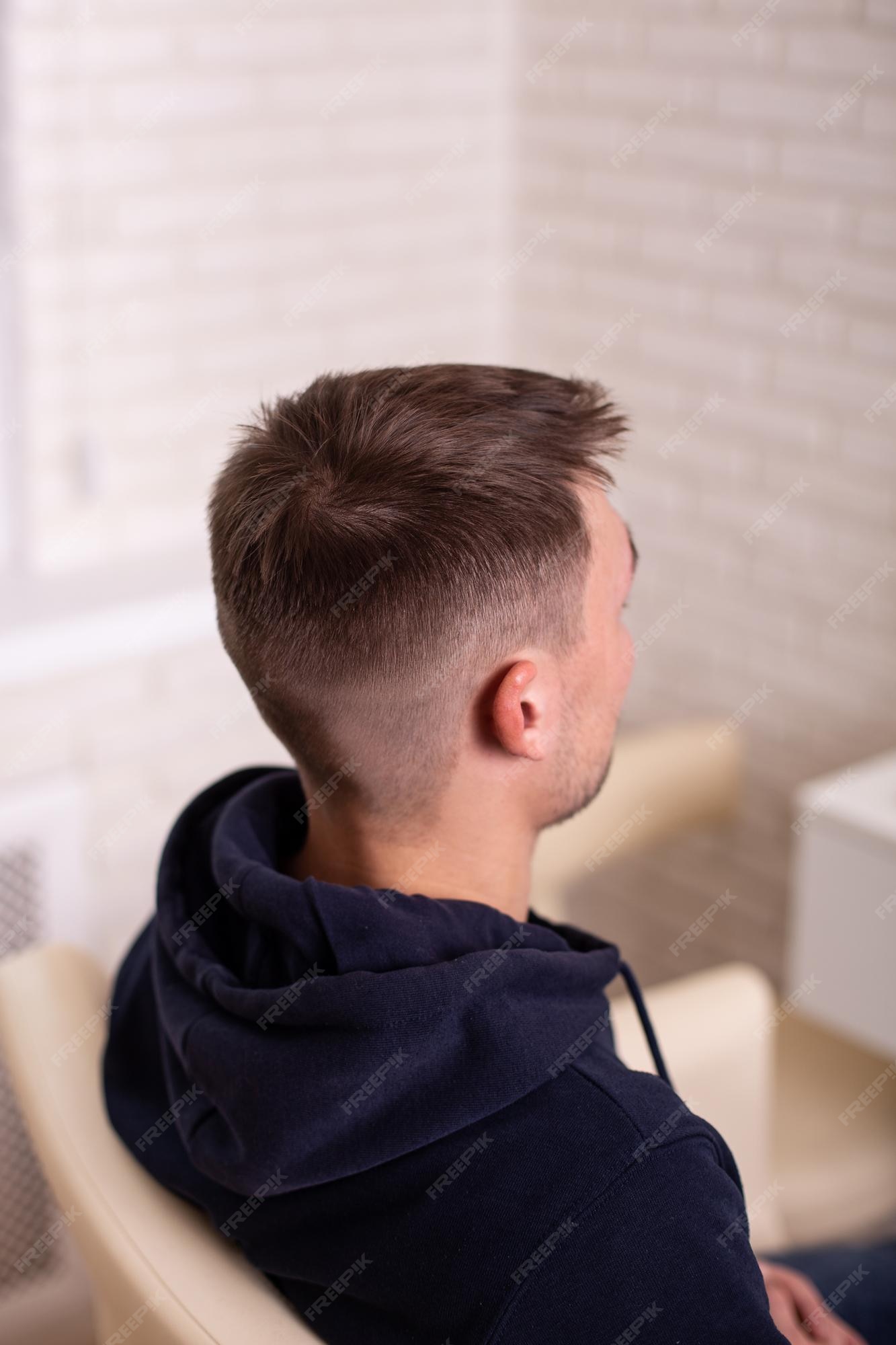 undercut hairstyle men back of head view