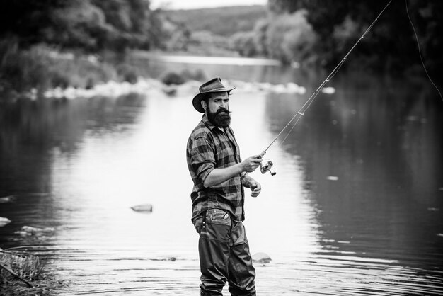 Male hobby Ready for fishing Relax in natural environment Trout bait Bearded elegant man Man relaxing nature background Strategy Hobby sport activity Activity and hobby Catching and fishing