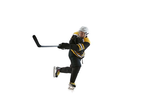 Photo male hockey player in motion during game with stick isolated on white background feeling