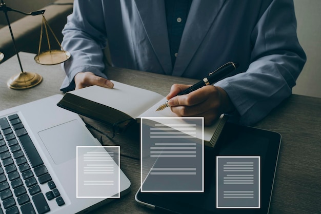 Male lawyer working with contract papers and wooden gavel on tabel in courtroom justice and law attorney court judge concept