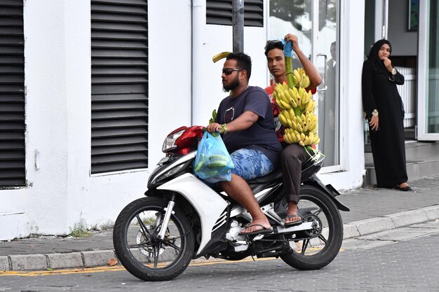 MALE, MALDIVES - MARCH, 4 2017 - Heavy traffic in the street before evening pray time