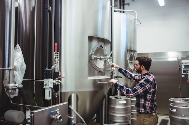 Male manufacturer working at brewery