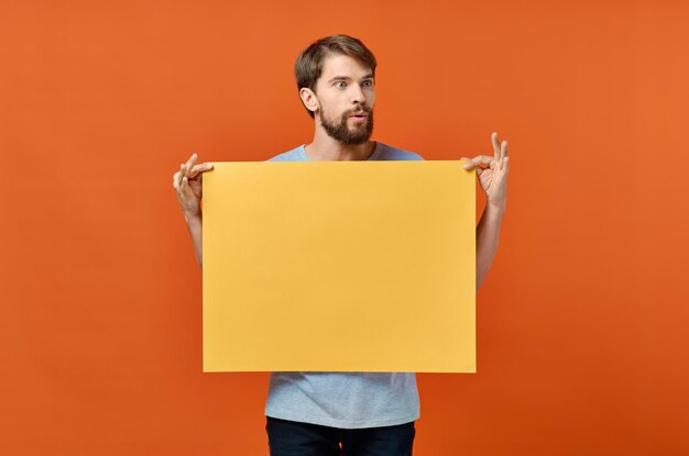 Male marketing poster advertising model orange paper sheet mockup person