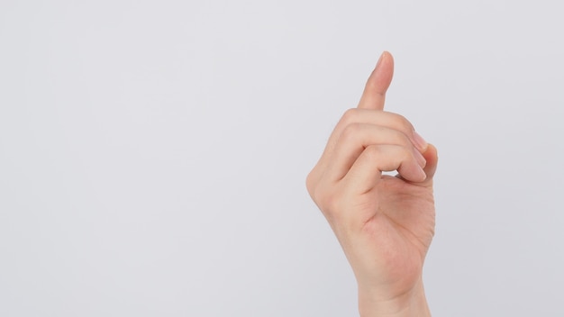 Male model is doing Hand gestures "E" alphabet on white background. A non-verbal method of communication