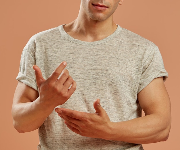 Male model with hand and arm injury in pain