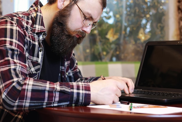 Male notebook work bearded