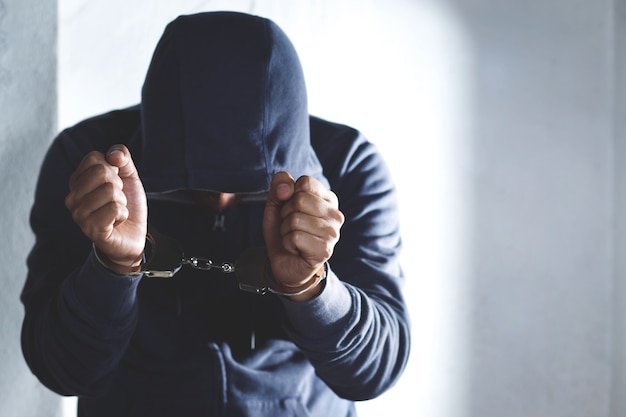 Male prisoner in handcuffs