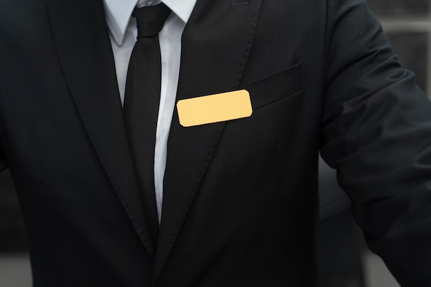 Male receptionist in elegant suit during work hours