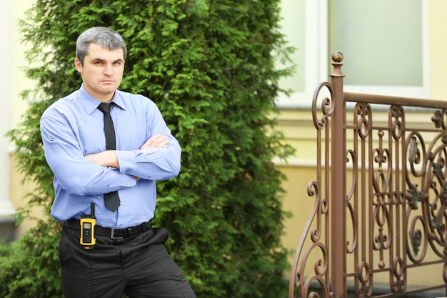 Male security guard in park