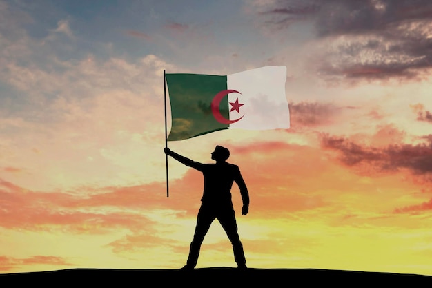 Male silhouette figure waving Algeria flag 3D Rendering