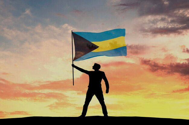 Male silhouette figure waving Bahamas flag 3D Rendering