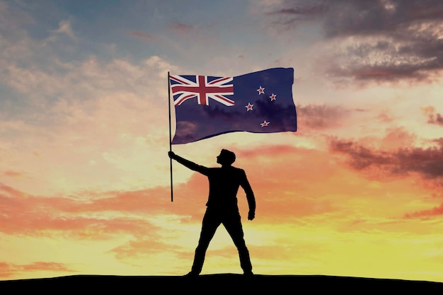 뉴질랜드 국기 3D 렌더링을 흔들며 남성 실루엣 그림