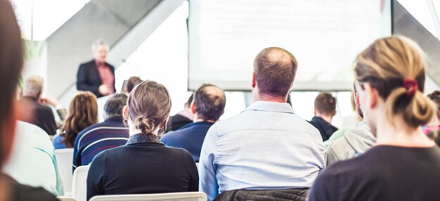 Male speeker having talk at public event