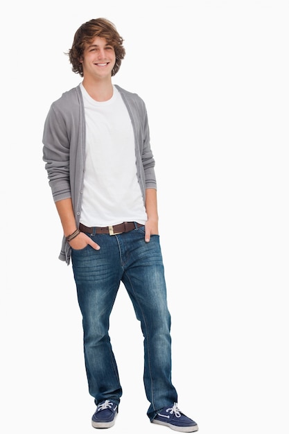 Male student posing hands in pockets