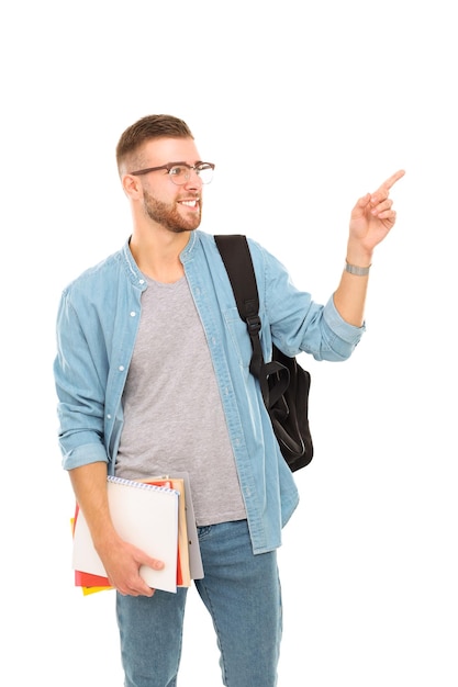 A male student with a school bag holding books isolated on white background Education opportunities College student