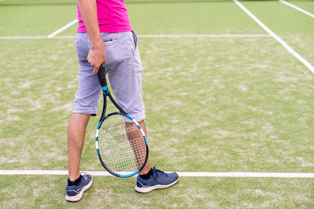 Male tennis player on the tennis court