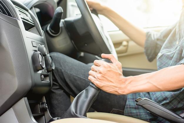 Male tourists are driving a vehicle.