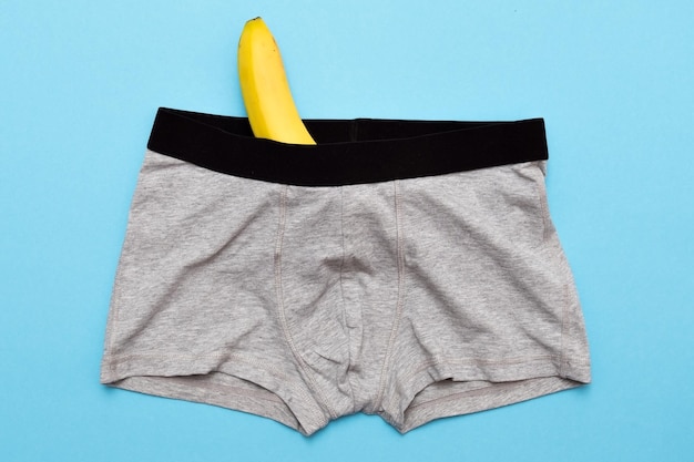 Male underwear with yellow banana in healthy sex concept