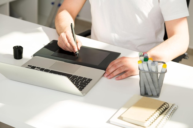 Male using graphic tablet