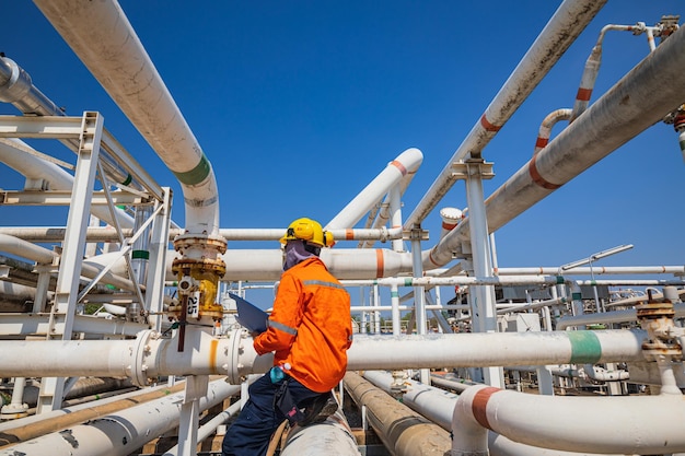 Male worker inspection at valve of visual check record pipeline oil and gas