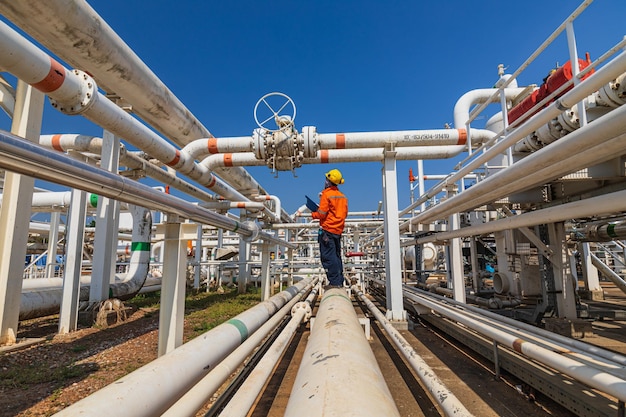 Male worker inspection at valve of visual check record pipeline oil and gas