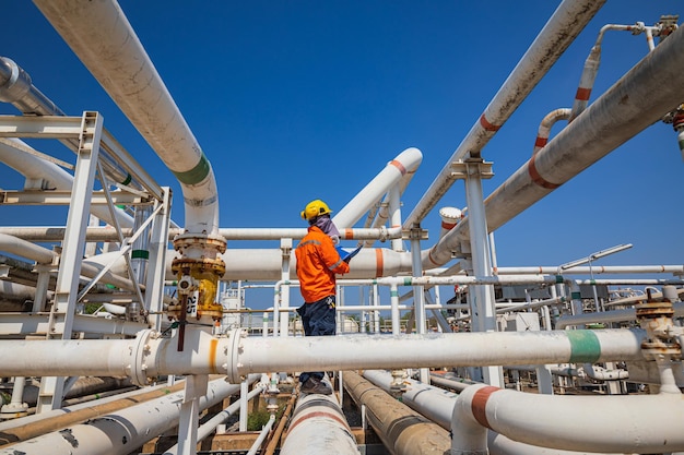 Male worker inspection at valve of visual check record pipeline oil and gas