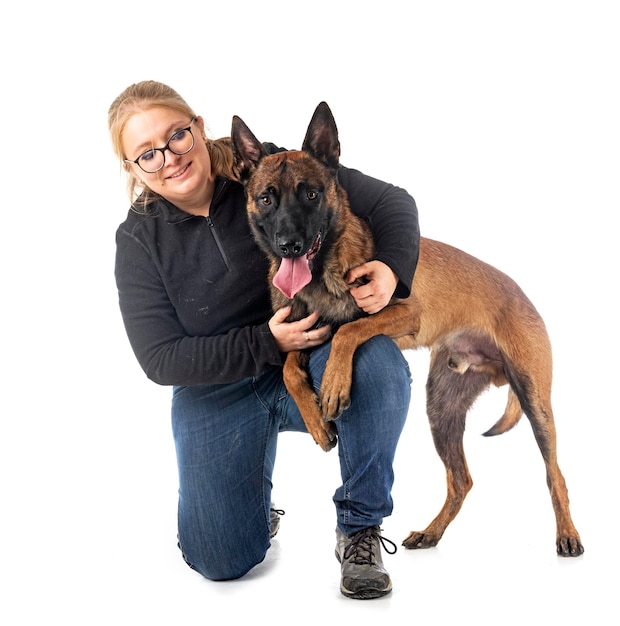 Malinois and woman in studio