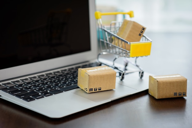 The mall cart and small paper box are empty on the laptop.