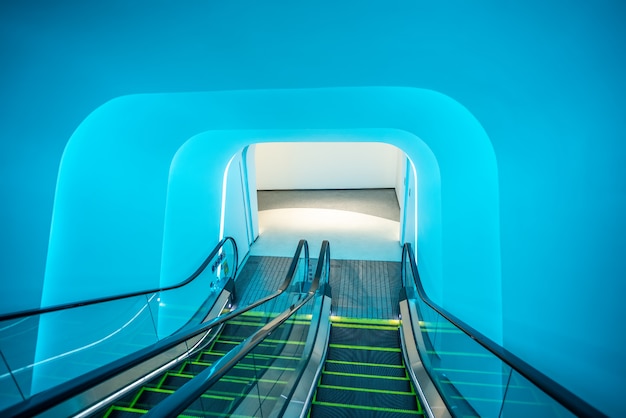 Mall escalator under blue light