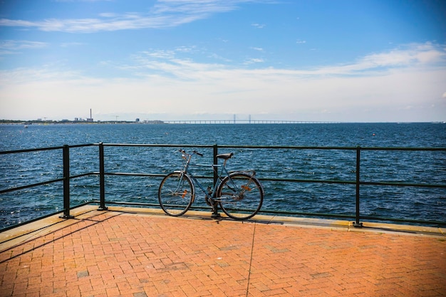 Malmo sea view with bicycle and Oresund bridge, Sweden