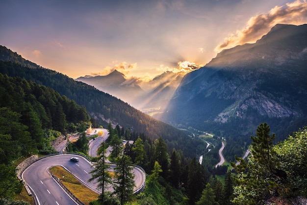 Maloja pass road in switzerland at sunset