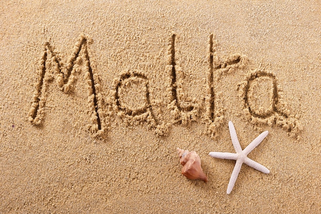 Malta beach writing sign travel concept