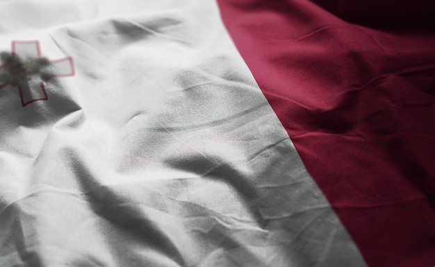 Photo malta flag rumpled close up