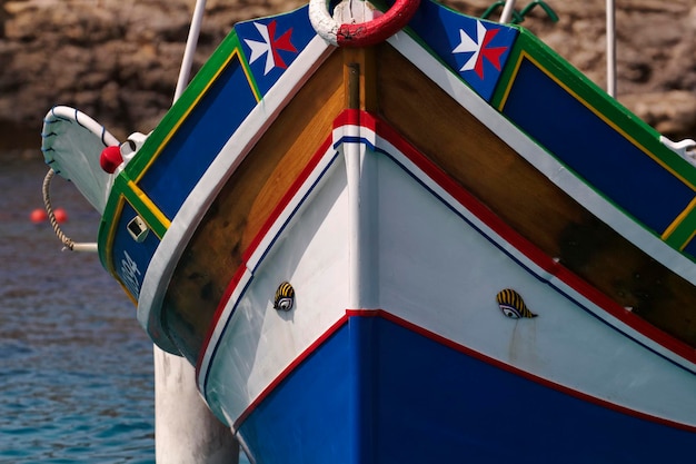 Malta Island, typical maltese fishing boat in Comino's Blue Lagoon