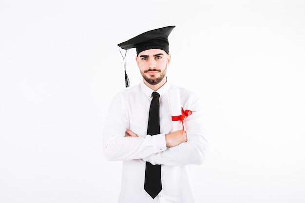 Photo man in academic cap with arms crosses