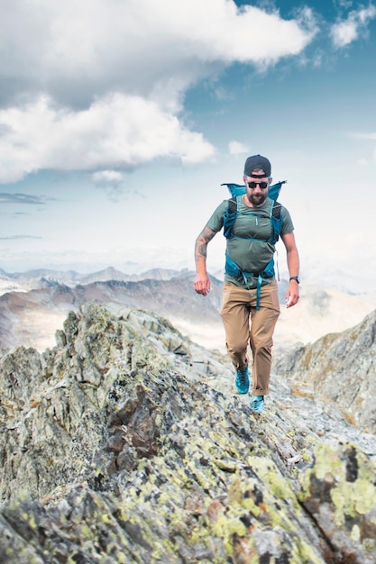 Man on alpine ridges