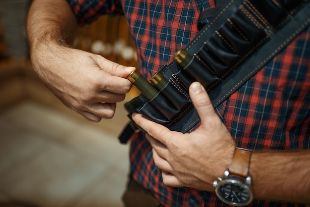 Photo man in ammo belt