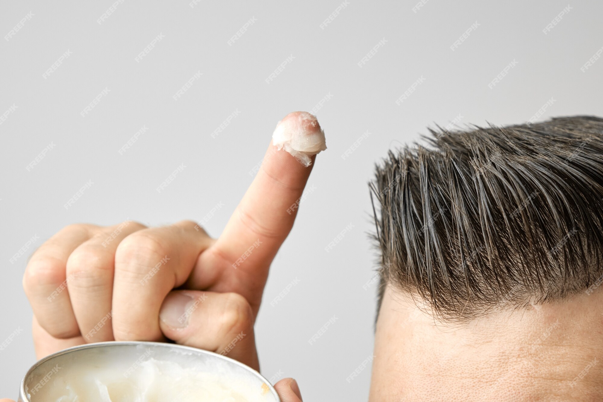 Premium Photo | Man applying styling gel on his hair Premium Photo | Man applying styling gel on his hair