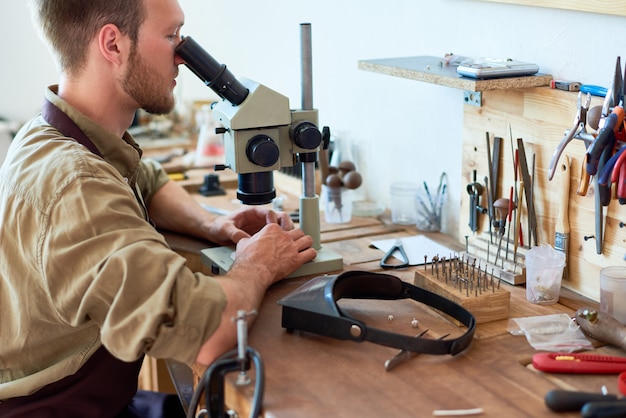 Man Appraising Jewelry