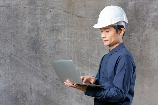 Man asian engineer with laptop 