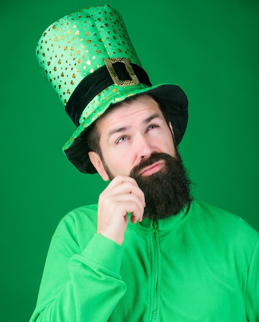 Man bearded hipster wear hat saint patricks day holiday green\
part of celebration happy patricks day global celebration st\
patricks day holiday known for parades shamrocks and all things\
irish