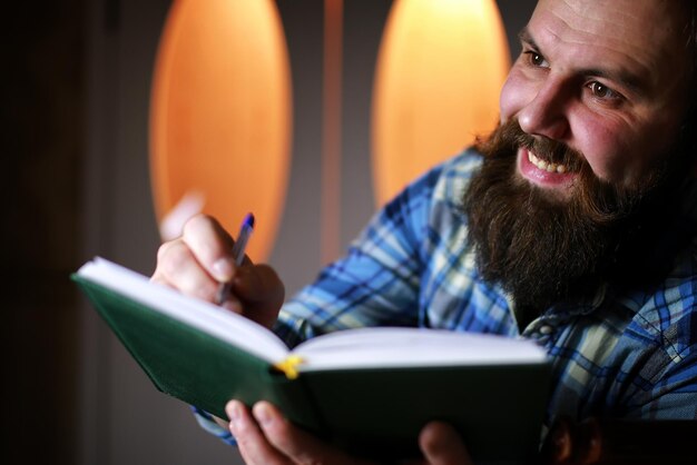 Man bearded read book