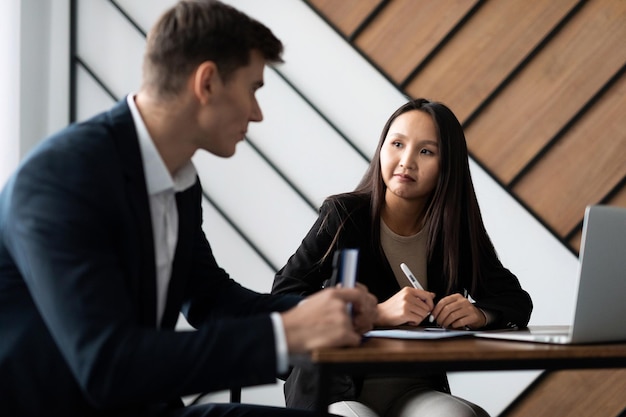 Man being interviewed at a job interview in the office