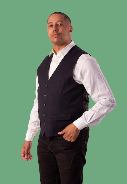 Man in black blazer, white shirt and black pants on a white background making body expressions.