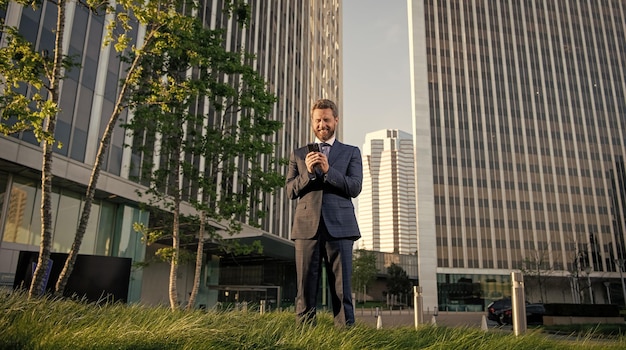 Man blogger use smartphone professional ceo working online typing and texting