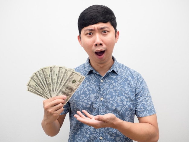 Man blue shirt excited show money in hand portrait