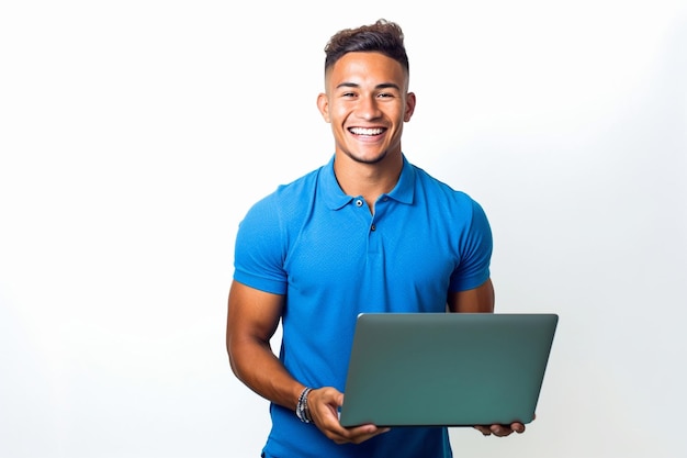 A man in a blue shirt is holding a laptop.