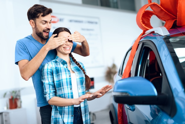 Man bought a new car for his young wife.