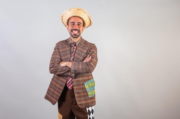 Man brazilian wearing festa junina clothes Arraial Feast of Saint John crossed arms