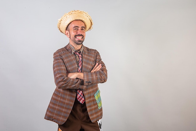 Man brazilian wearing festa junina clothes Arraial Feast of Saint John crossed arms